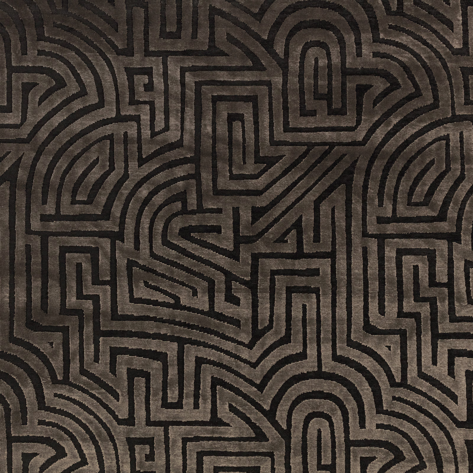 Espresso brown fabric with black interlocking maze lines and a subtly textured surface