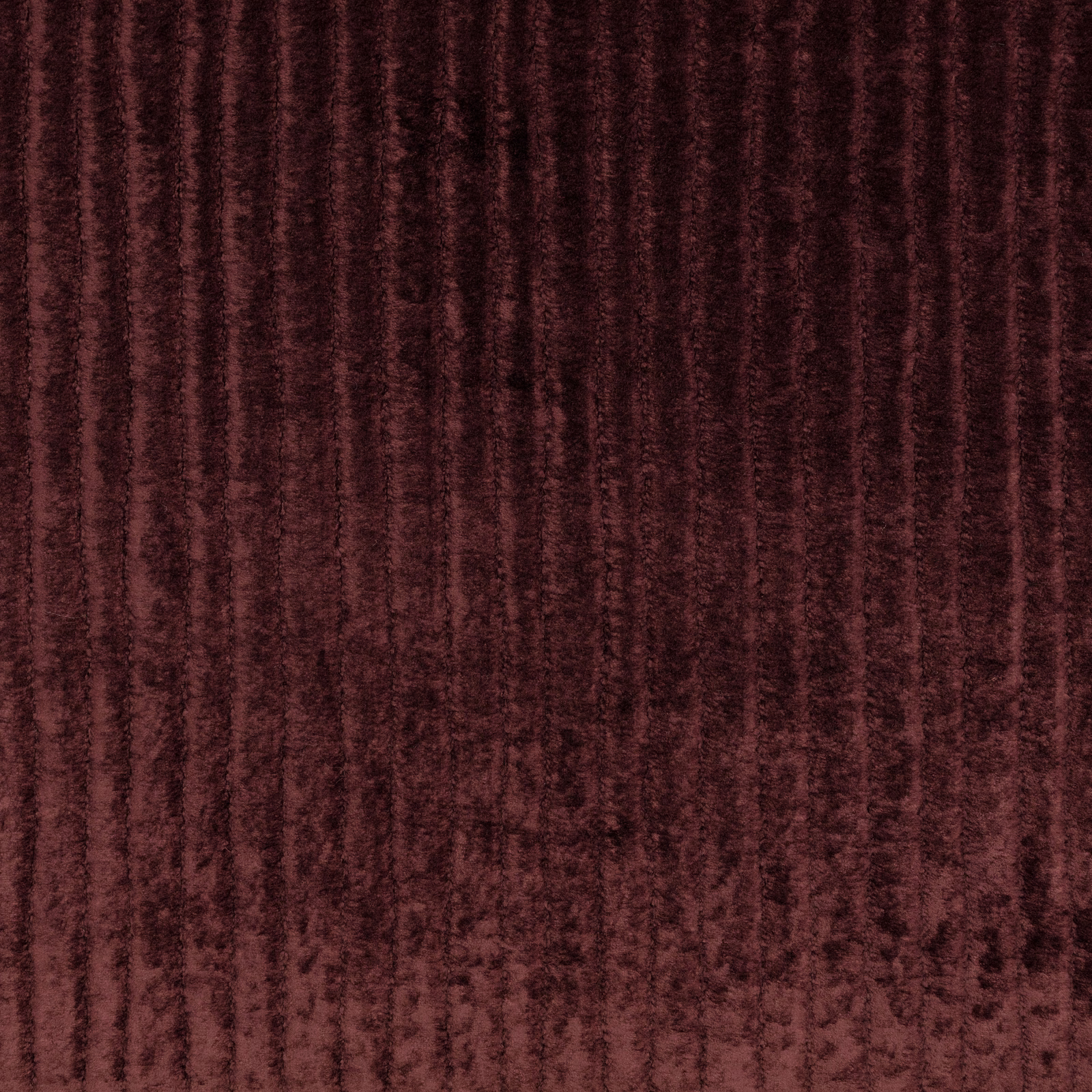 Deep burgundy velvet with shadowed vertical striations and a softly mottled pile