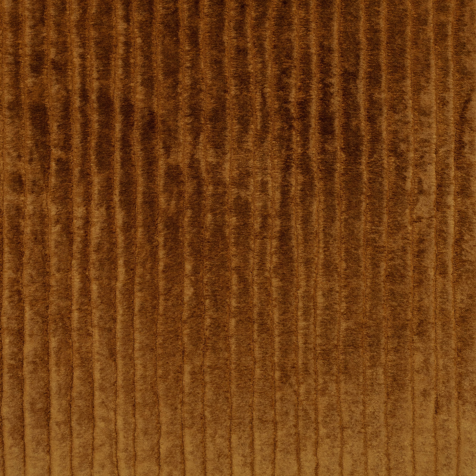 Warm cognac-brown velvet with softly irregular vertical striations and shifting pile highlights