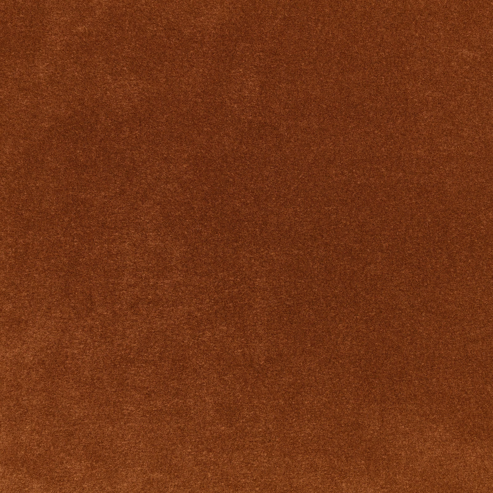 Warm cognac-brown velvet swatch showing a softly brushed, subtly directional pile