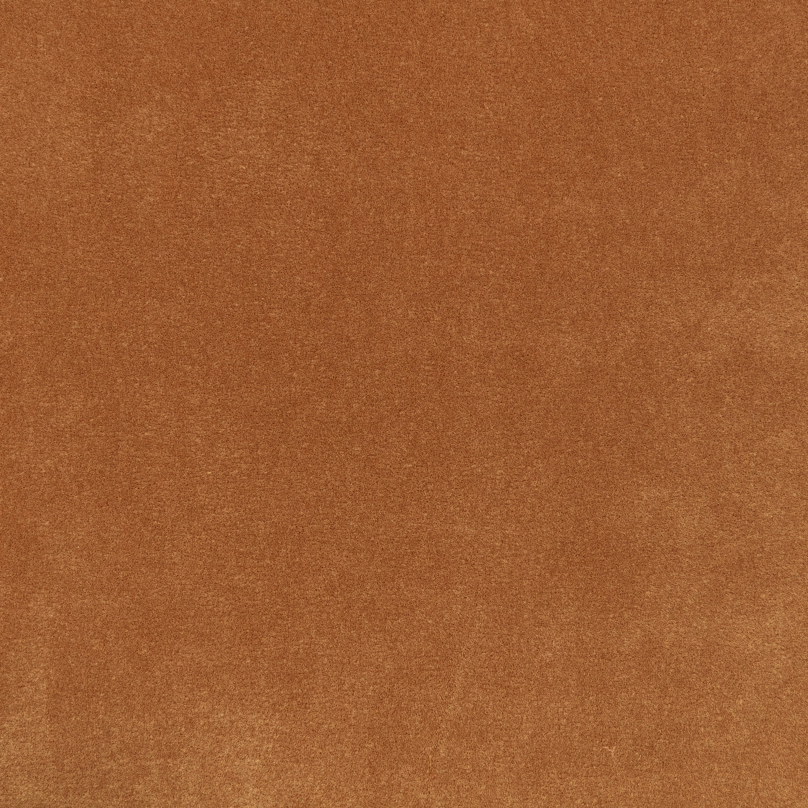 Warm saddle-brown velvet with softly mottled pile and subtle coppery light