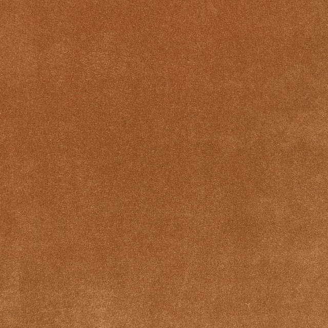 Warm saddle-brown velvet with softly mottled pile and subtle coppery light