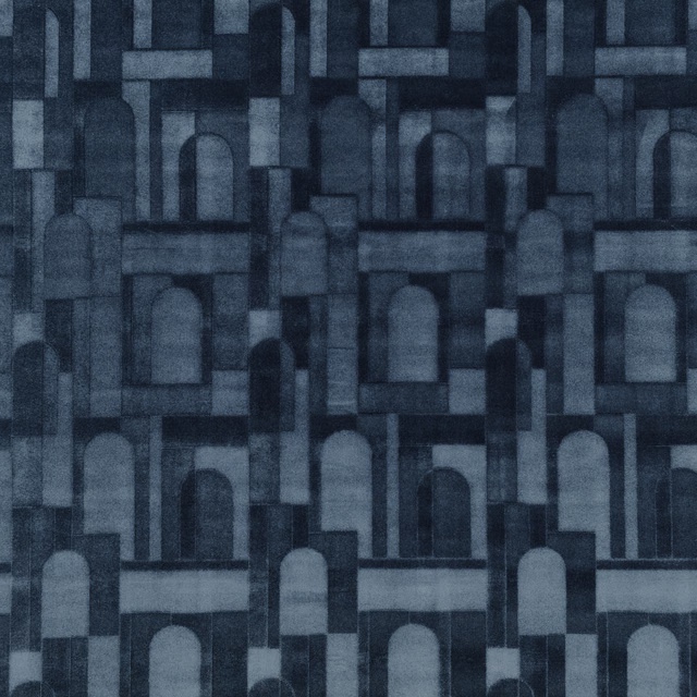Dark twilight-blue textile with layered architectural arches and softly mottled woven texture