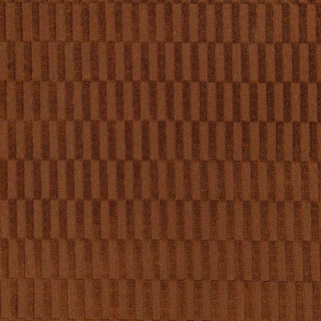 Warm russet-brown woven fabric with vertical rectangular blocks and ribbed texture