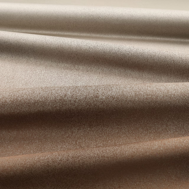 Warm stone-bronze textile with fine mottling shown in softly folded drapery