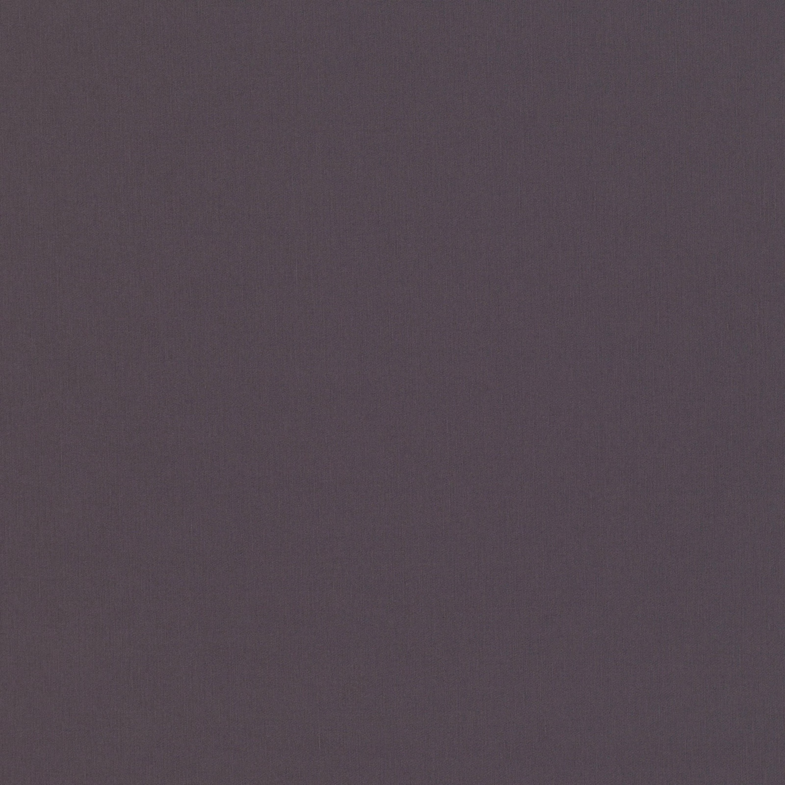 Close-up of smoky plum-grey fabric with a fine, subtly mottled woven texture