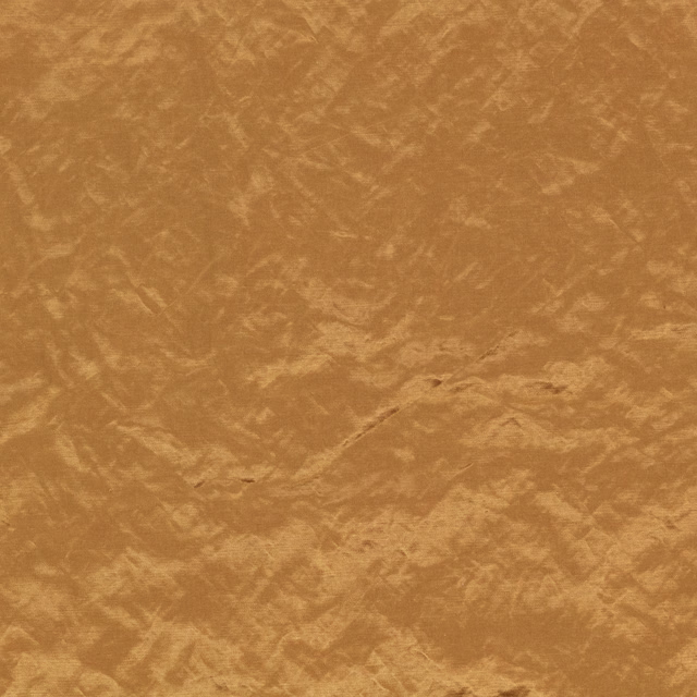 Warm ochre-brown fabric with cloudy painterly mottling and subtle surface sheen