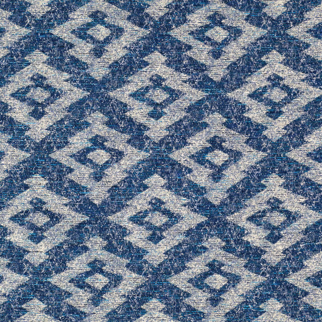 Ink-blue and cream woven swatch with repeated mottled diamond motifs
