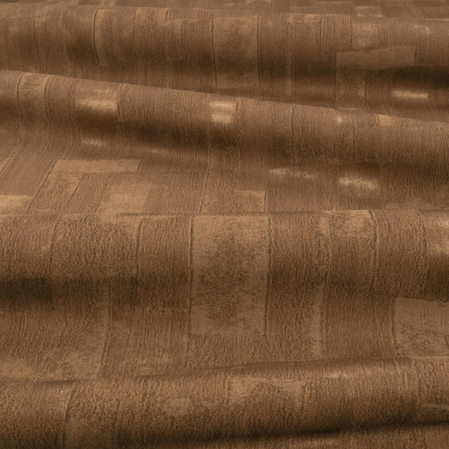 Warm teak-brown textile with tonal rectangular panels and a soft directional sheen
