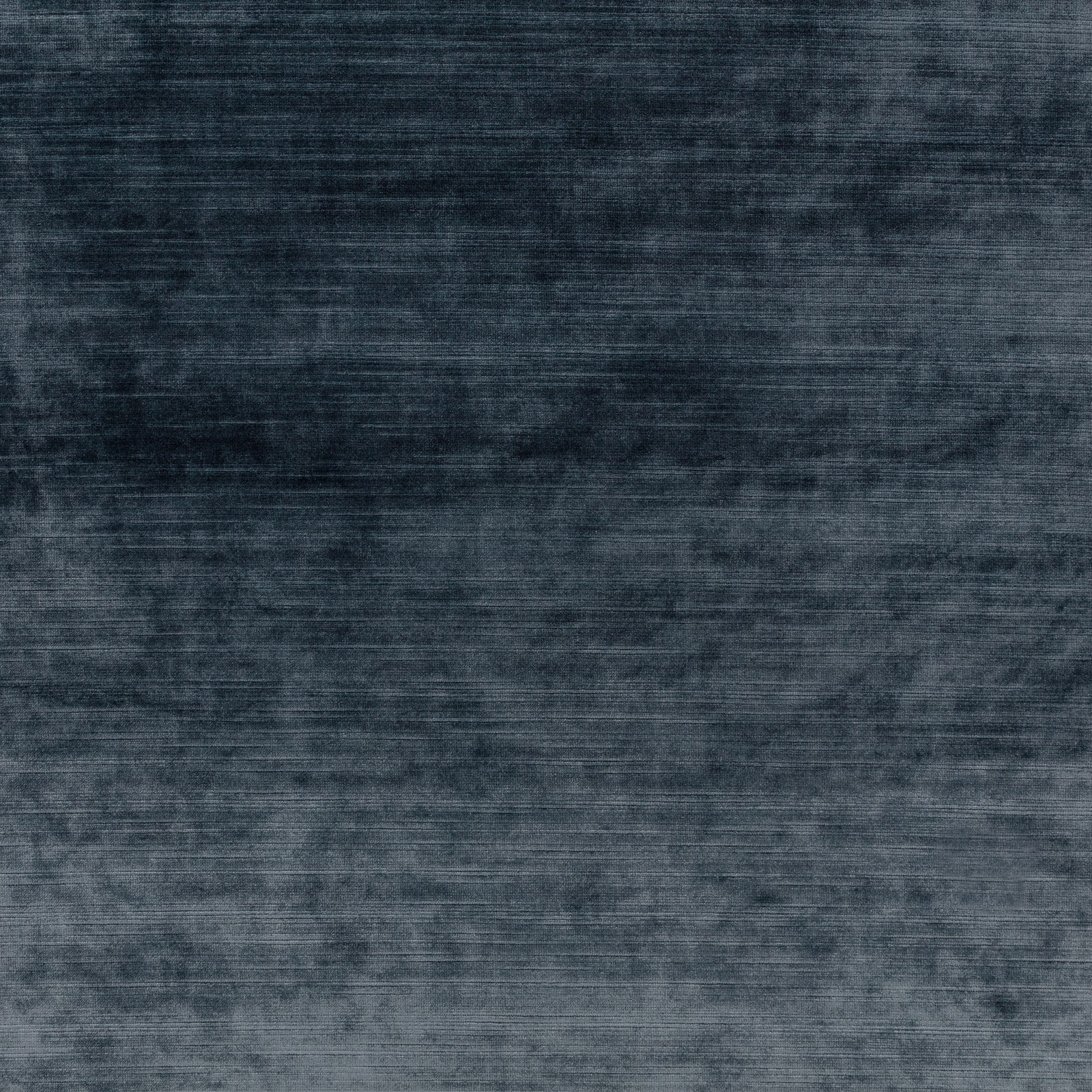 Deep ink-blue fabric with smoky horizontal striations and charcoal mottling