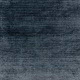 Deep ink-blue fabric with smoky horizontal striations and charcoal mottling