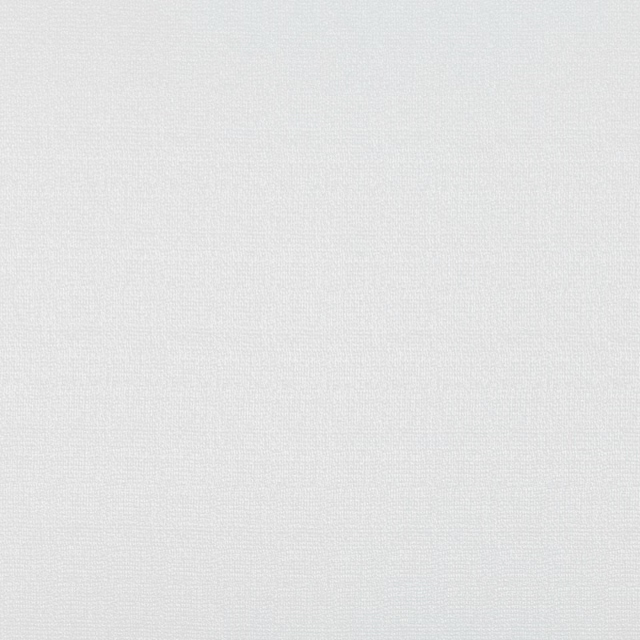 Close-up of pale frosted grey fabric with a fine, even woven texture