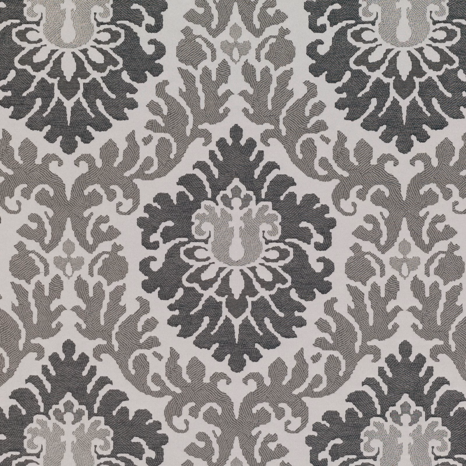 Silver grey woven damask with charcoal medallions and pale curling foliage