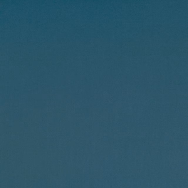 Deep teal-blue plain weave with a softly shaded, finely textured surface