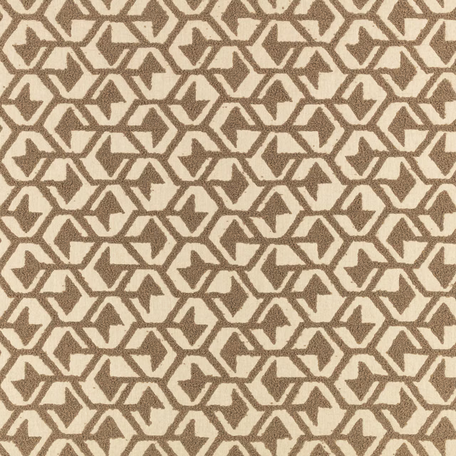 Warm taupe and ivory woven textile with interlocking angular hexagonal motifs
