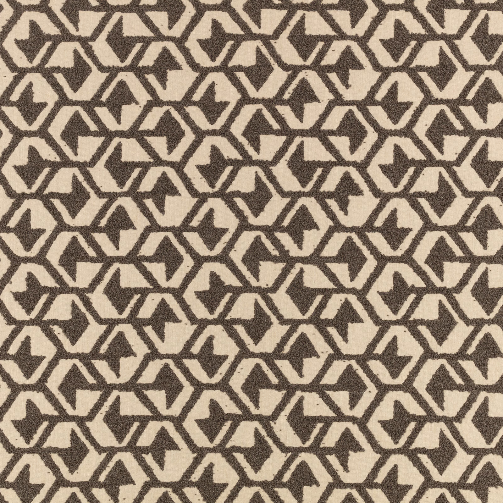 Cream woven fabric with repeating carbon-brown hexagons and angular motifs