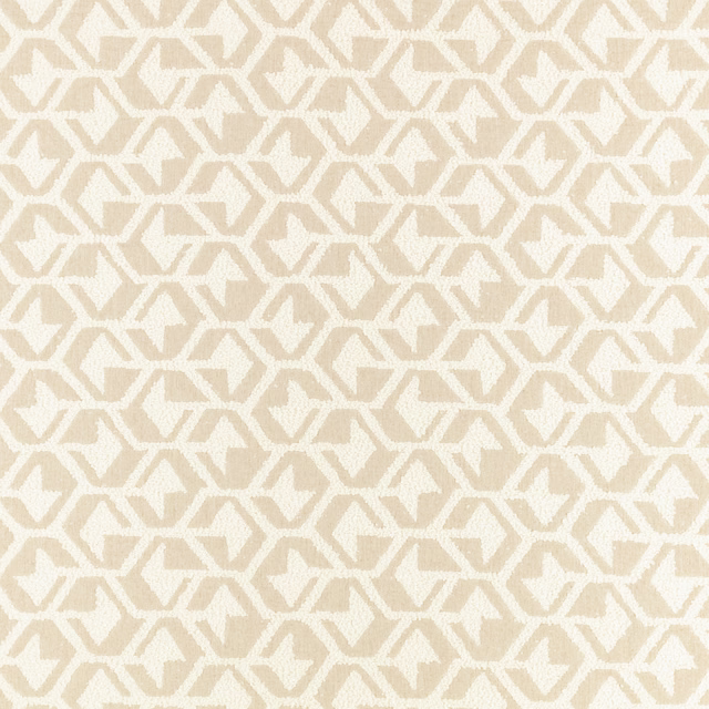 Warm ivory textile with small beige angular geometric motifs and subtle surface texture