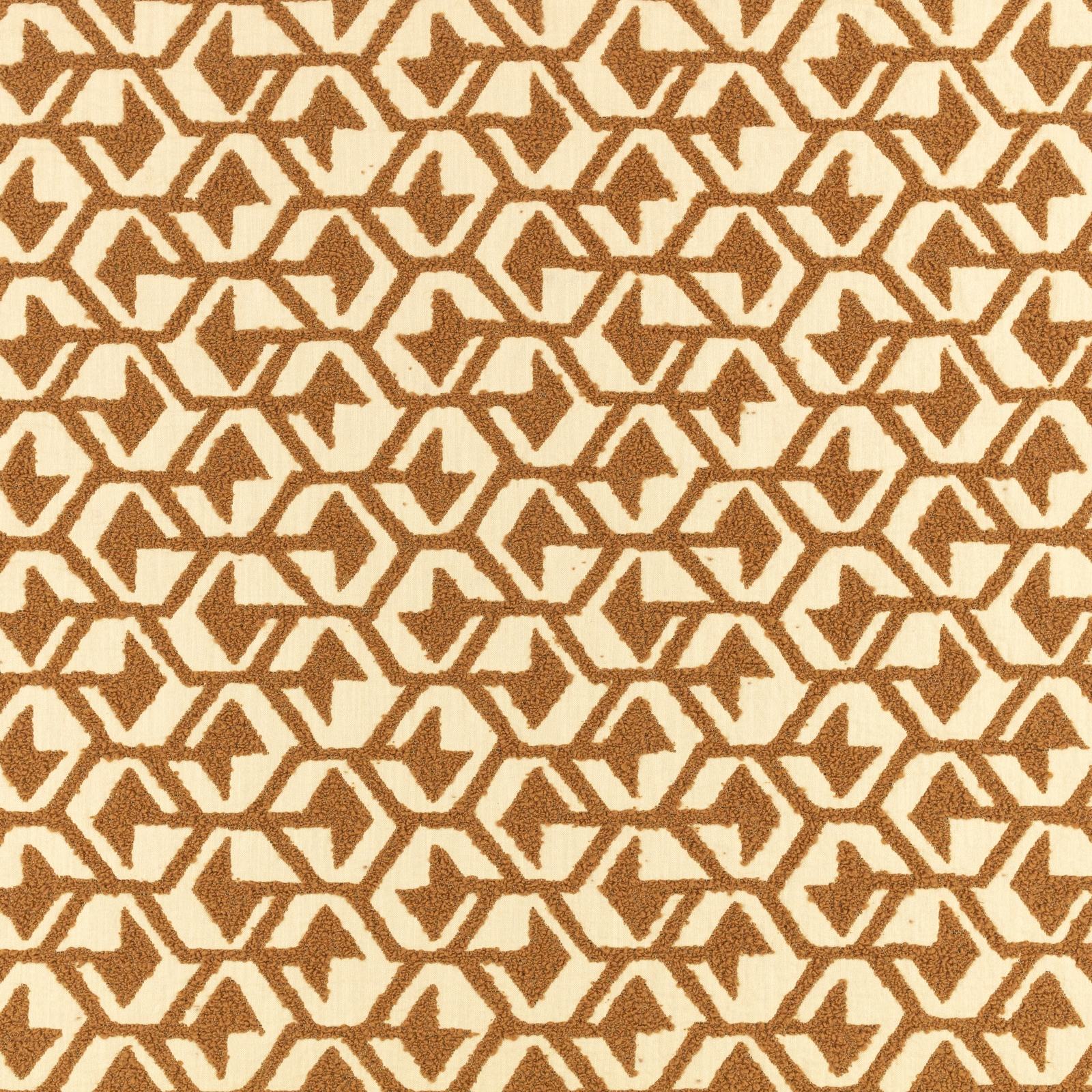 Warm tan angular motifs repeating across a lightly textured cream textile ground