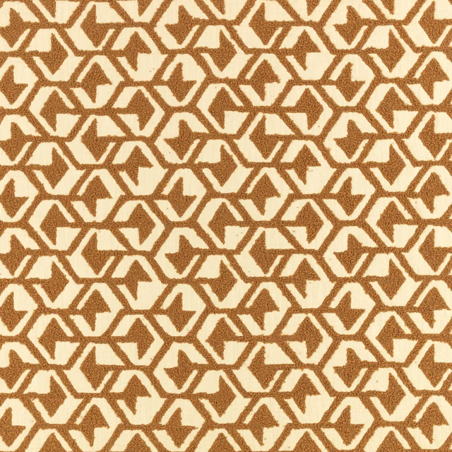 Warm tan angular motifs repeating across a lightly textured cream textile ground