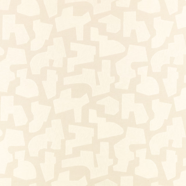 Ivory and cream fabric with softly textured interlocking geometric shapes