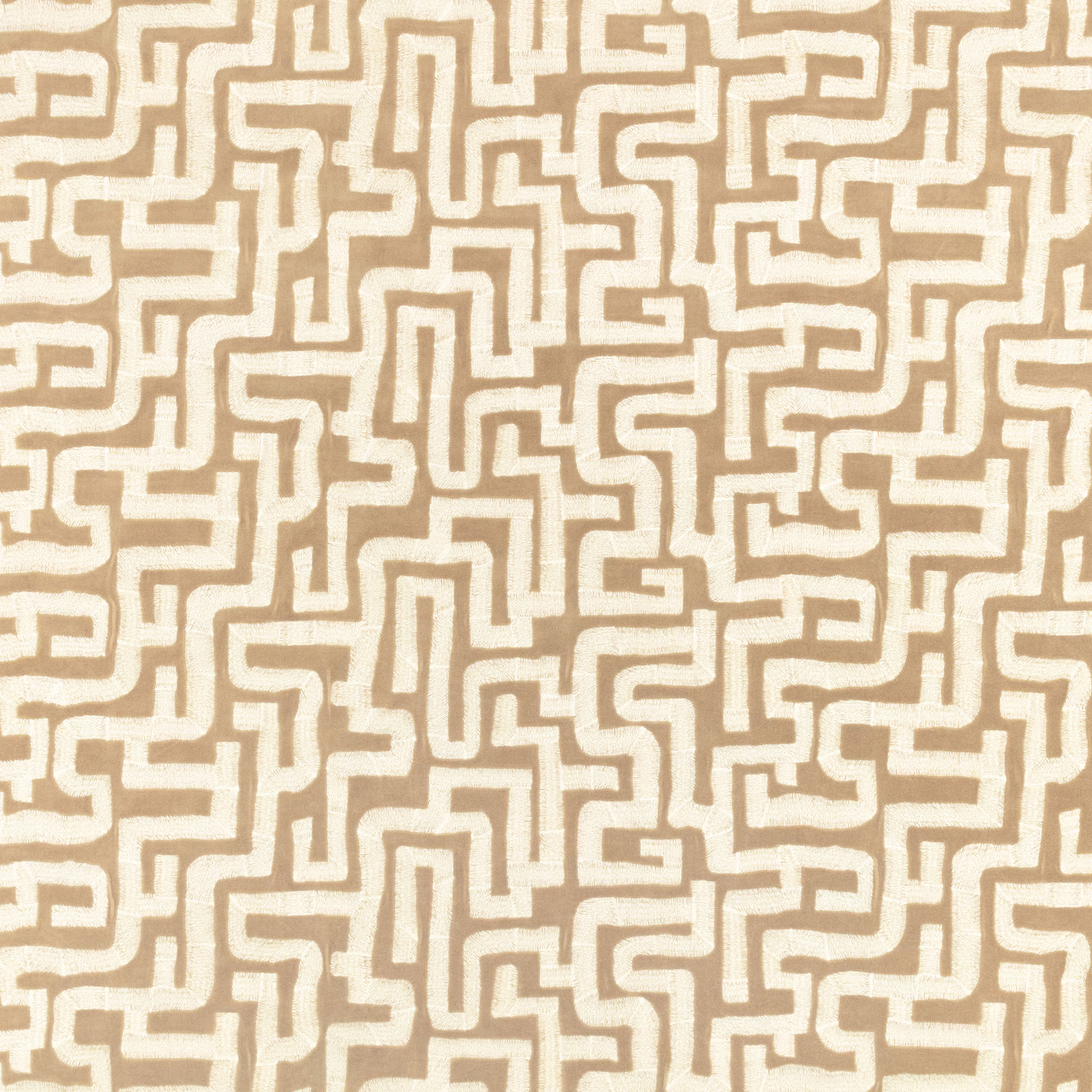 Warm taupe woven fabric with ivory interlocking maze pattern and soft texture