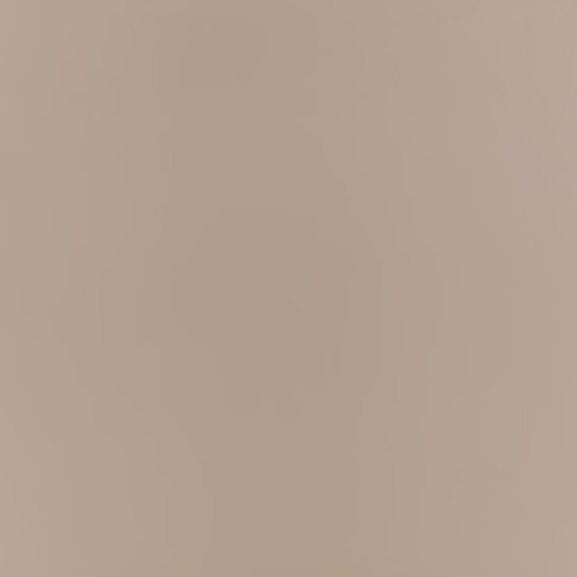 Matte putty taupe textile swatch with a softly even, barely textured surface