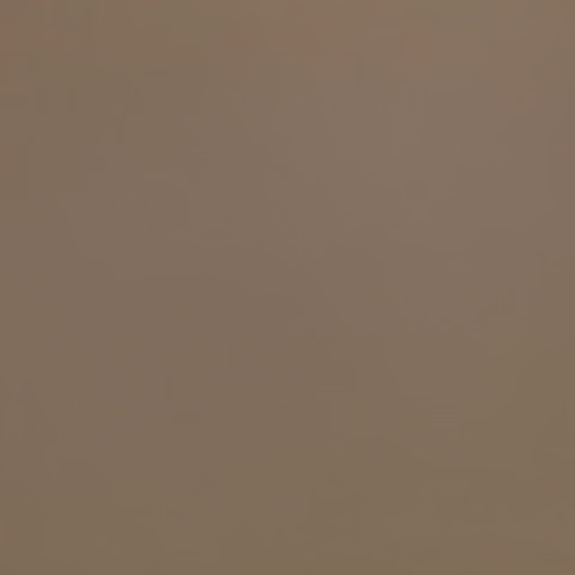 Warm truffle taupe fabric with a smooth, uninterrupted brown-grey surface