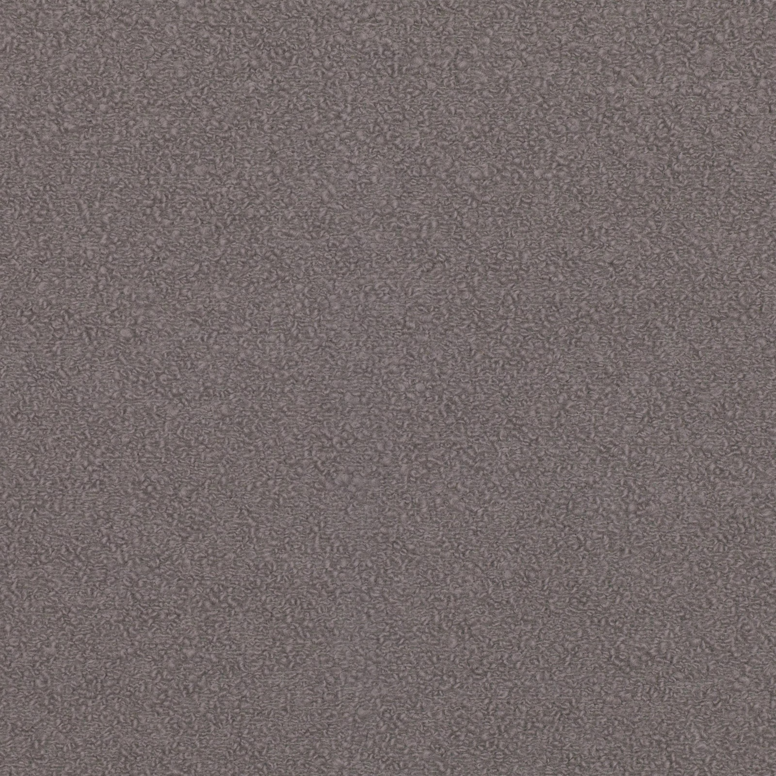 Close view of Zumirez Umber’s warm taupe ground and fine pebbled texture