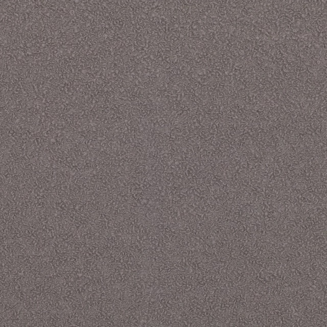Close view of Zumirez Umber’s warm taupe ground and fine pebbled texture