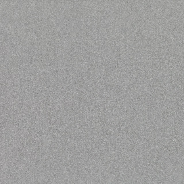 Close-up of cool silver grey fabric with a fine, subtly mottled woven texture