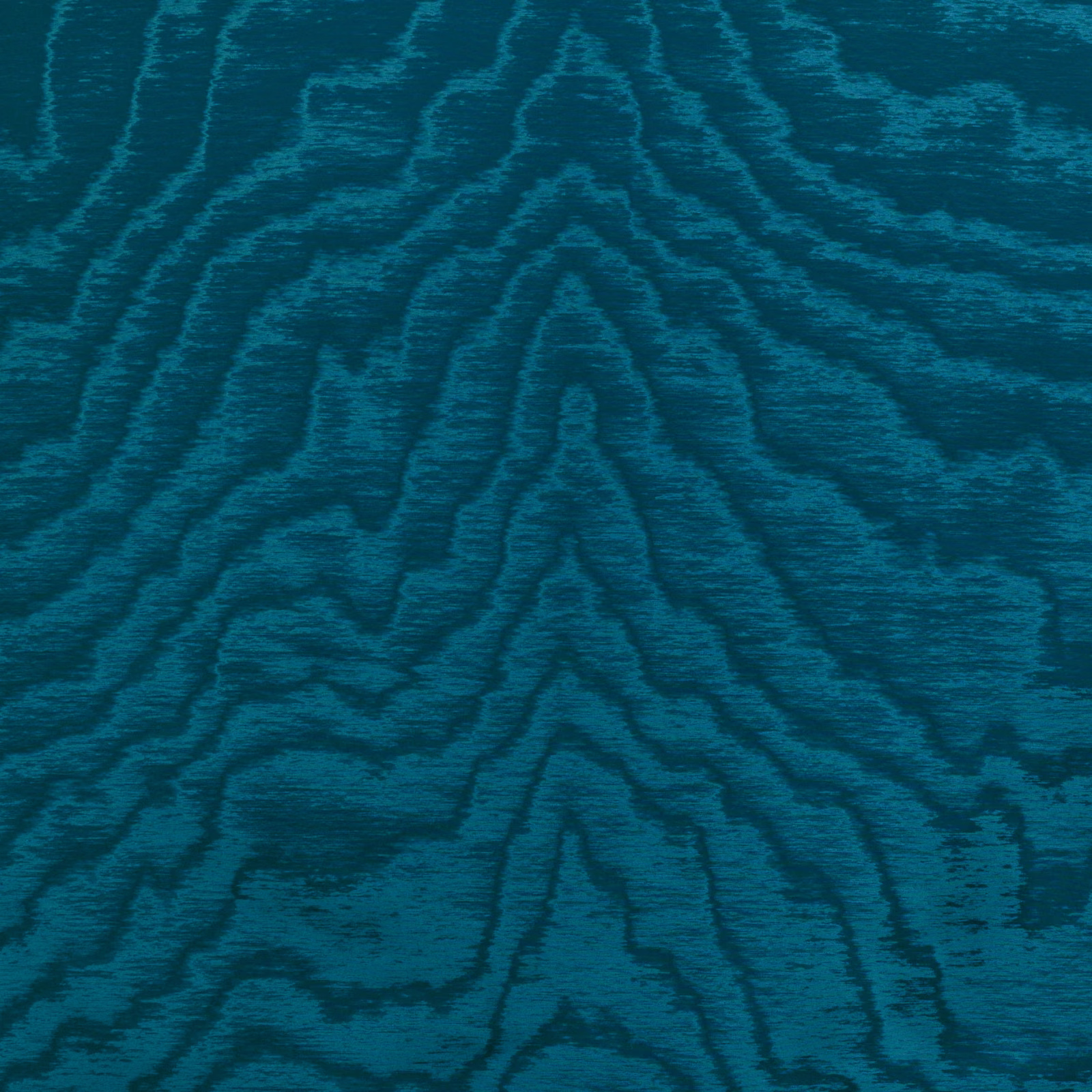 Deep lagoon teal textile with dark flowing woodgrain lines and subtle directional sheen