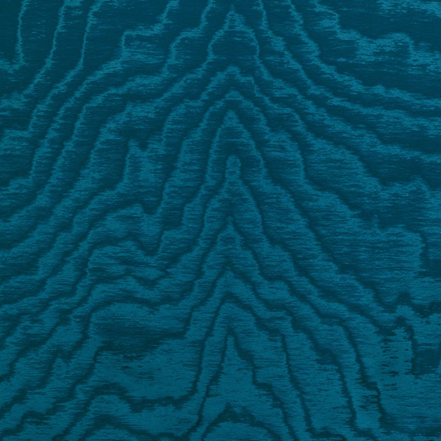 Deep lagoon teal textile with dark flowing woodgrain lines and subtle directional sheen