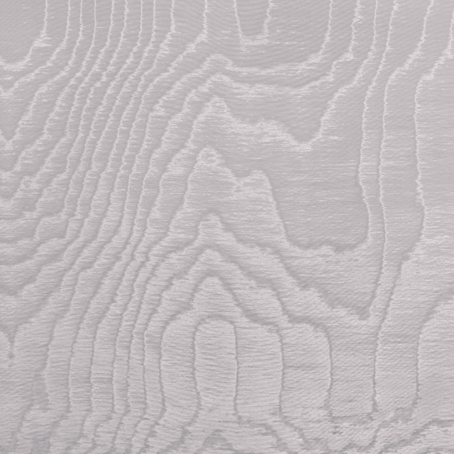 Pale silver-grey woven fabric with flowing, irregular woodgrain-like lines