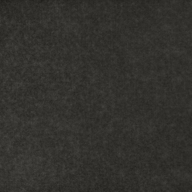 Close view of deep charcoal-grey Crillon Tungsten fabric with subtle mottled texture
