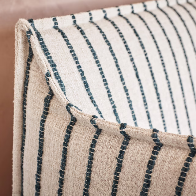 Cream-beige woven swatch with narrow broken dark-teal vertical stripes and nubby texture