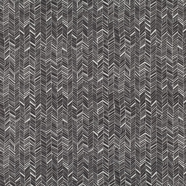 Black and charcoal woven textile with repeated light chevron columns and fine textured detail