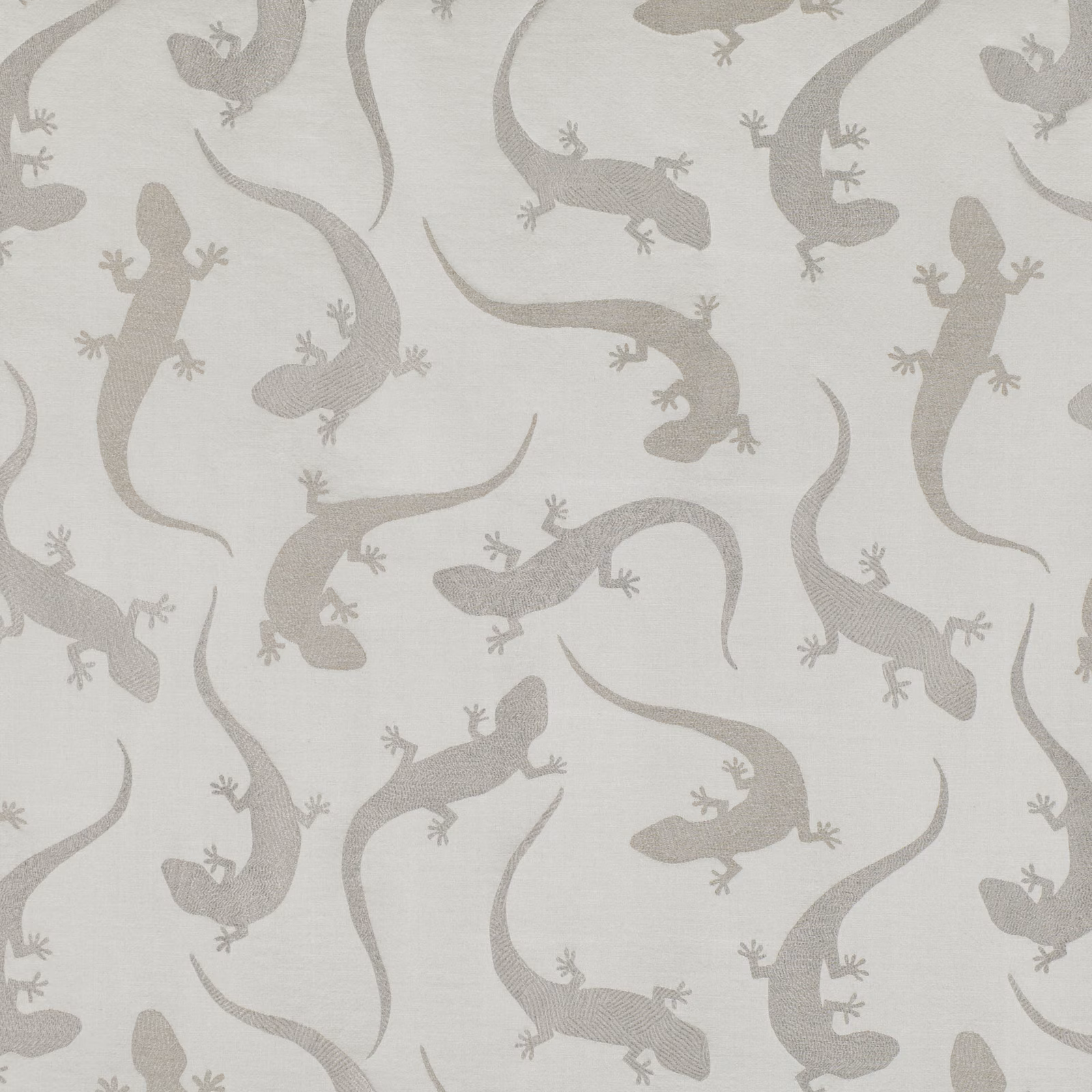 Pale greige fabric with muted taupe salamanders and subtle woven texture