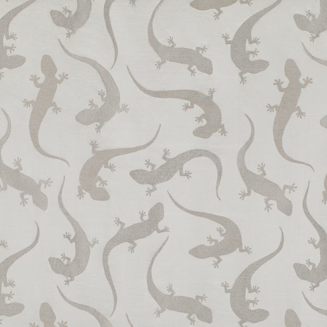 Pale greige fabric with muted taupe salamanders and subtle woven texture