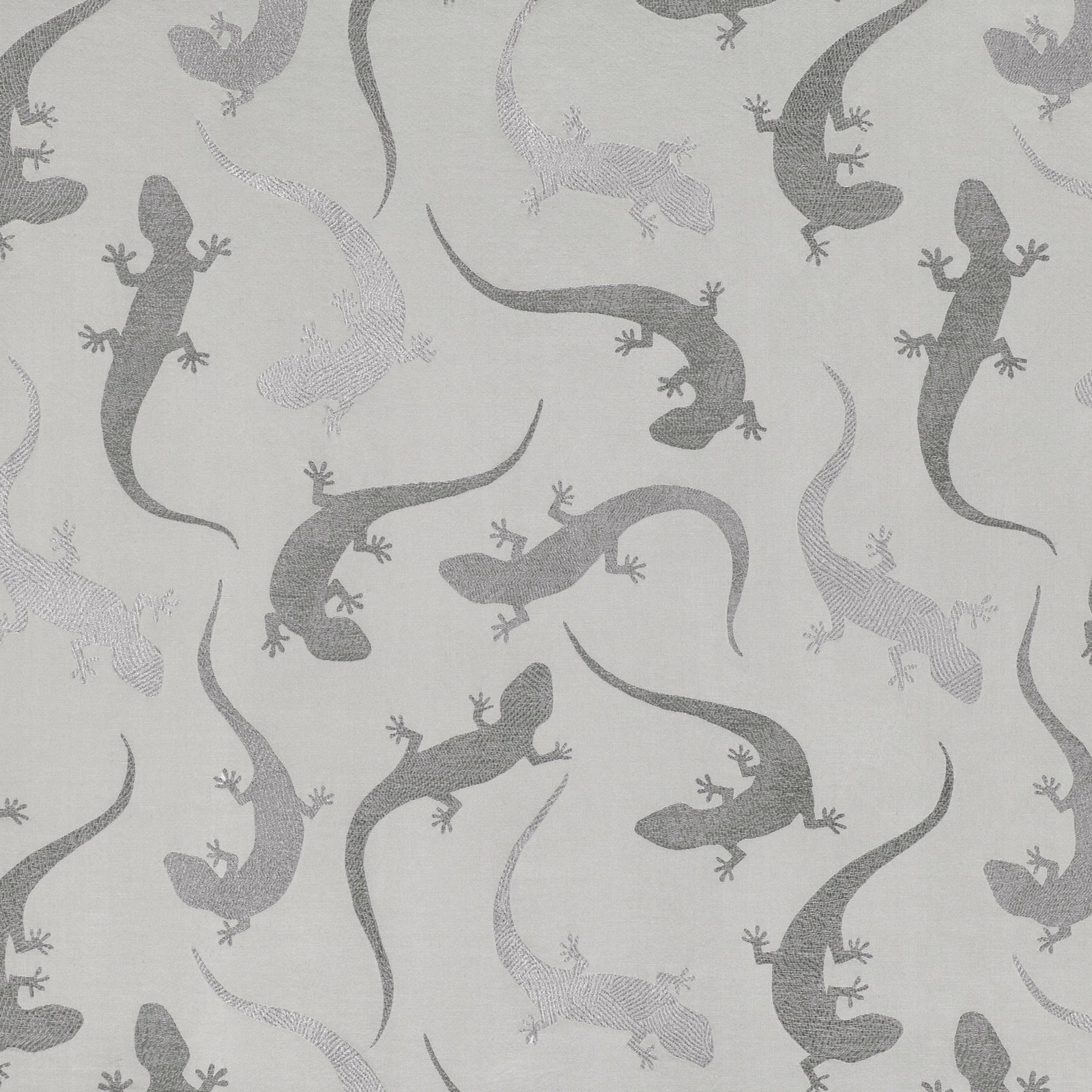 Silver-grey fabric with scattered charcoal salamanders and pale textured reptile motifs