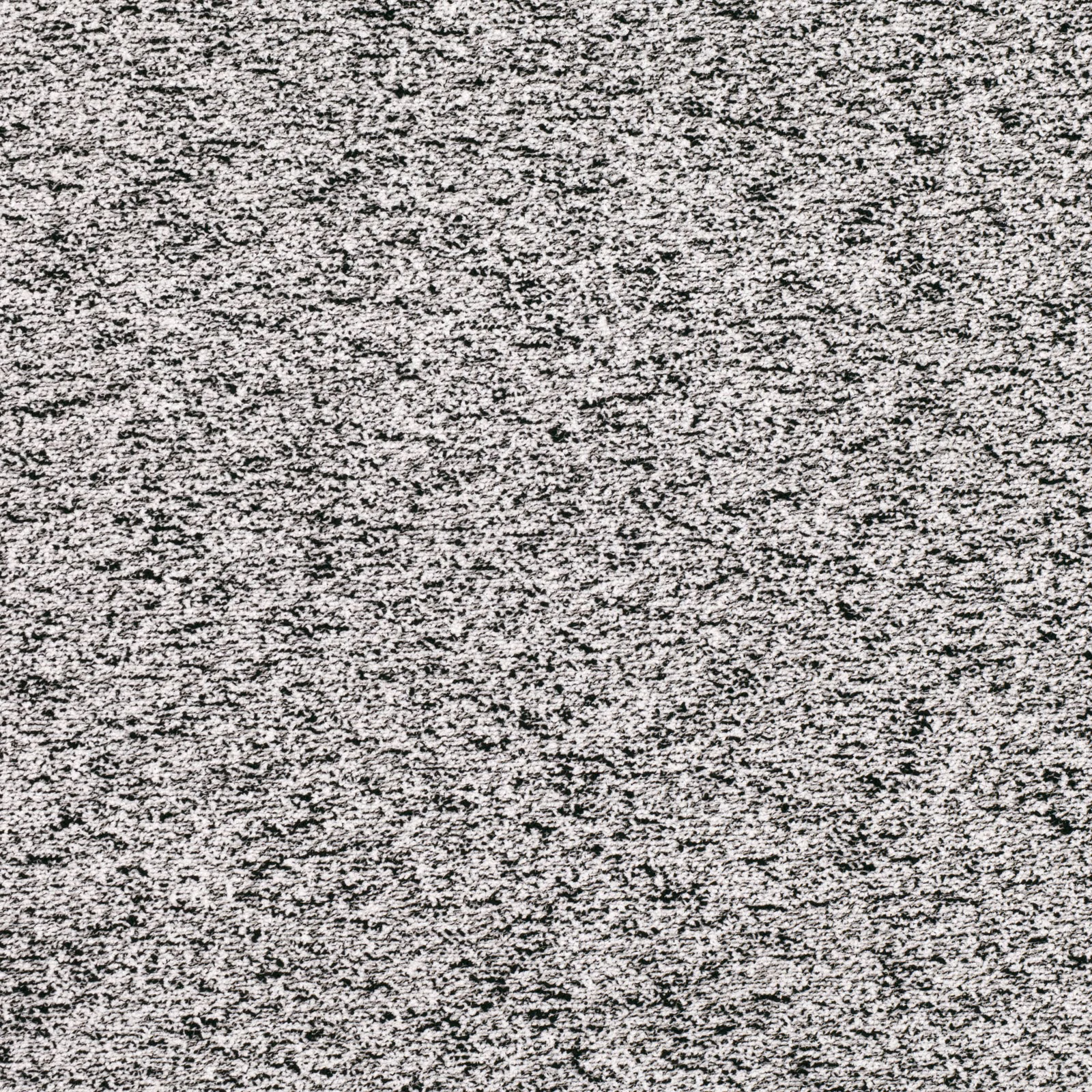 Cool grey-white woven textile with dense black flecks and broken horizontal texture