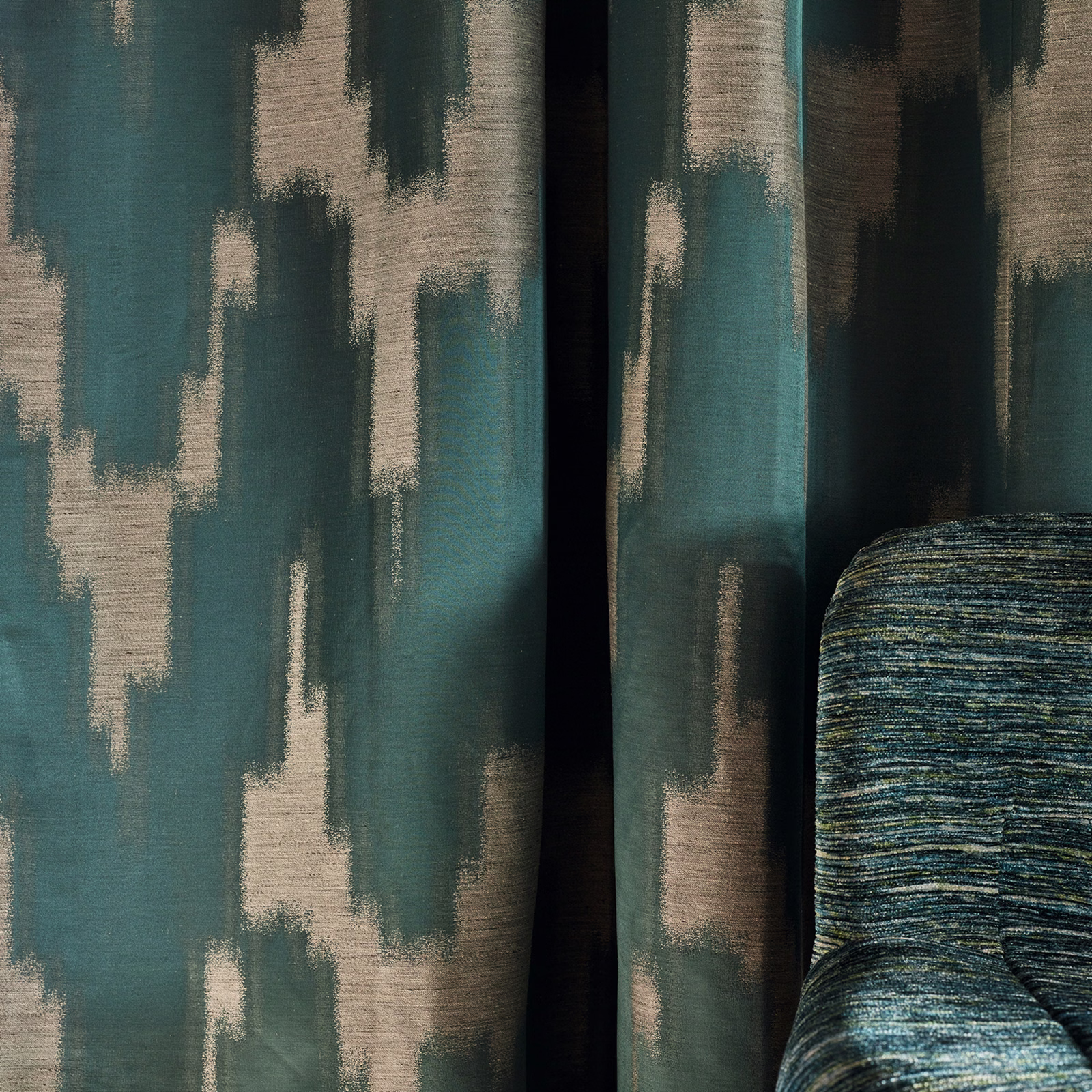 Deep teal abstract woven fabric with taupe blocks and charcoal vertical strokes