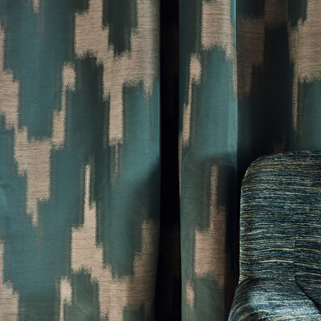 Deep teal abstract woven fabric with taupe blocks and charcoal vertical strokes
