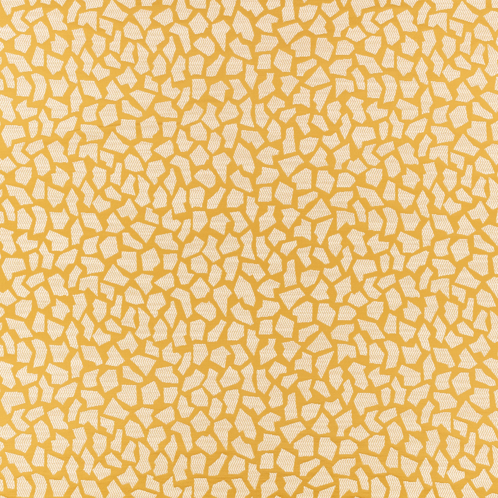 Warm ochre textile covered in dense small cream irregular flecks with subtle texture