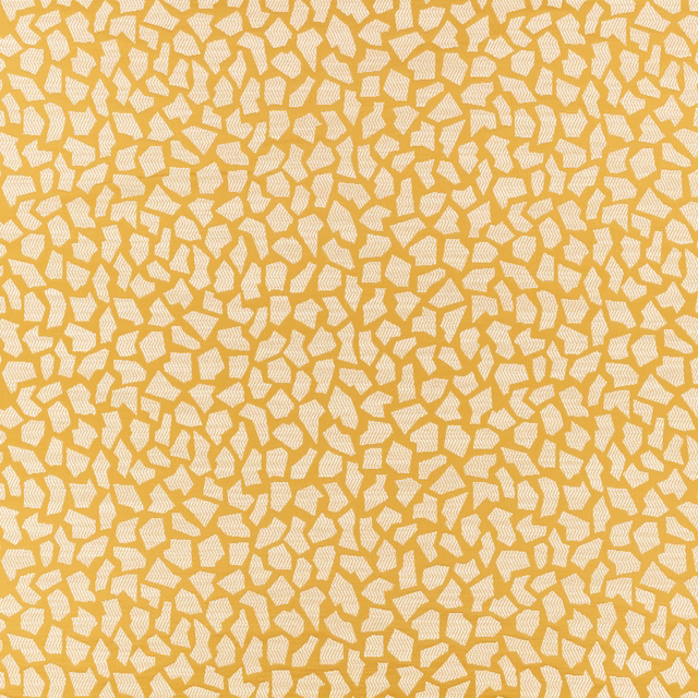 Warm ochre textile covered in dense small cream irregular flecks with subtle texture