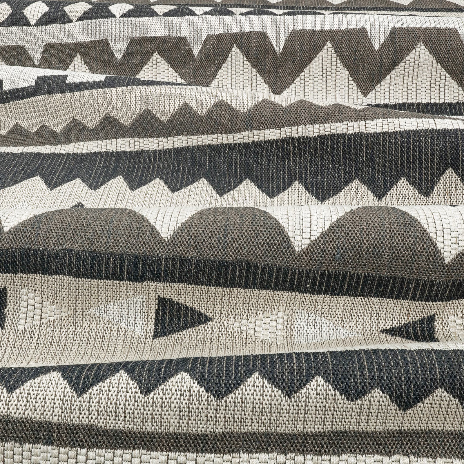 Charcoal and greige woven geometric bands with zigzags, scallops and triangles