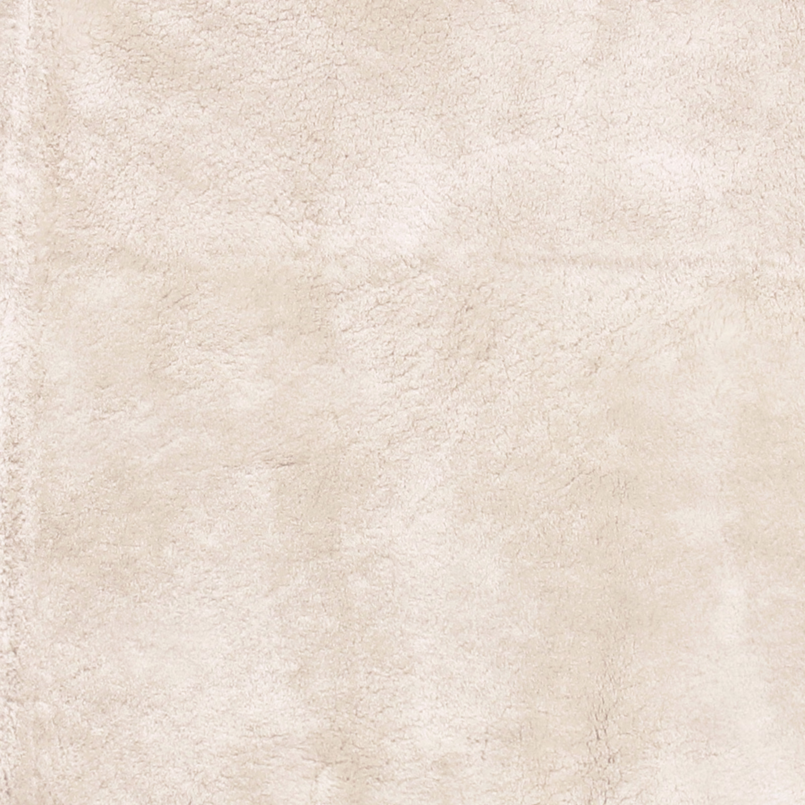 Pale ivory cream fabric with cloudy sheepskin-like texture and faint beige mottling