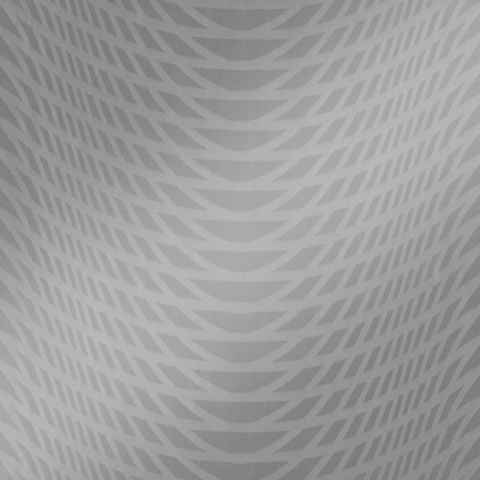 Cool storm-grey fabric with layered curved chevrons and a softly matte surface
