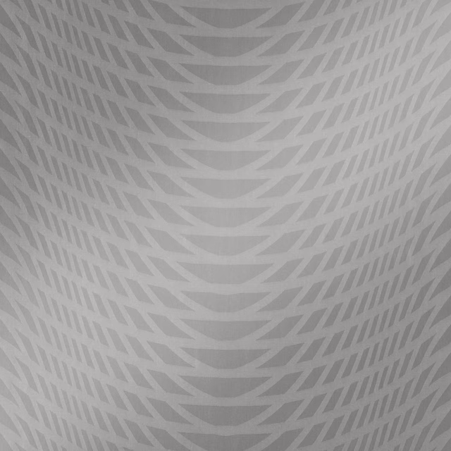 Cool storm-grey fabric with layered curved chevrons and a softly matte surface