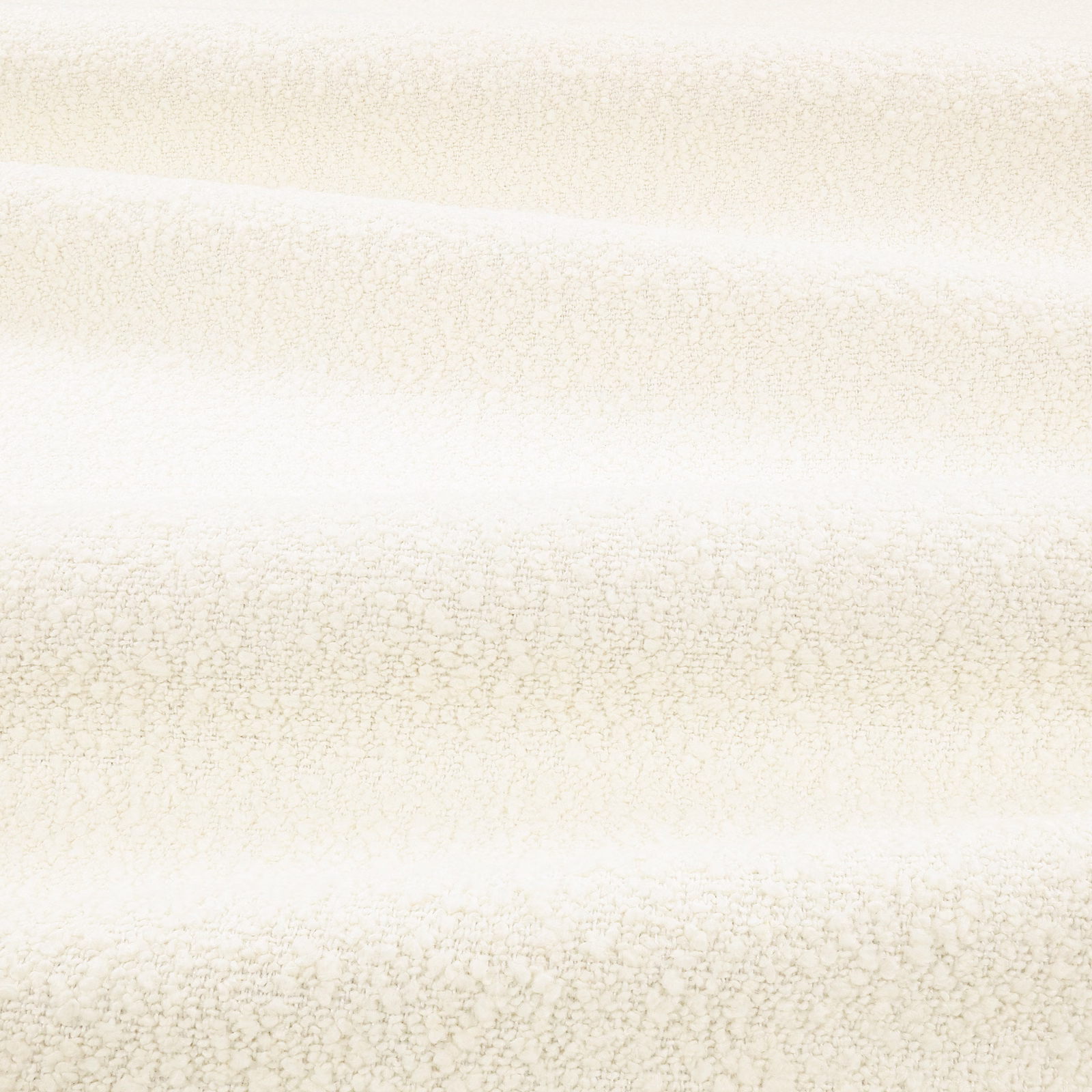 Warm parchment ivory boucle with nubby texture and soft horizontal tonal bands
