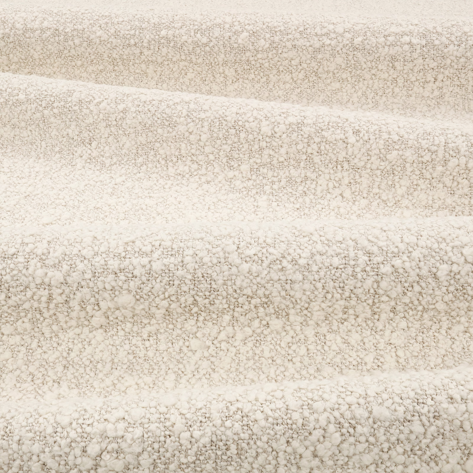 Pale stone greige bouclé with small ivory flecks and a nubby looped texture